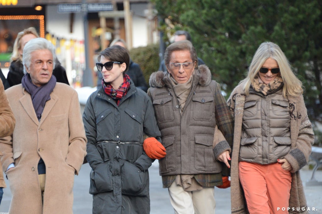 Anne Hathaway and Valentino walking down Gstaad streets